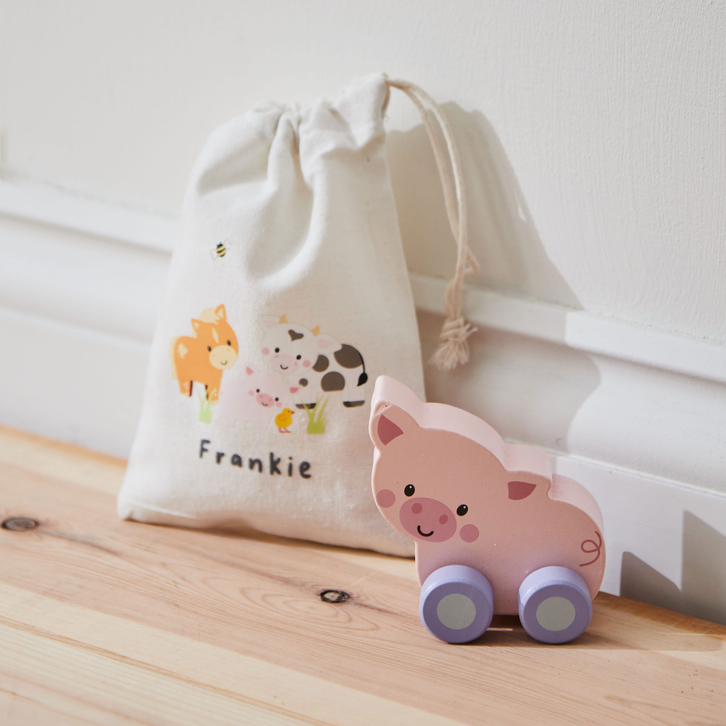 Personalised Tree Toys Wooden Push-Along Pig Toy